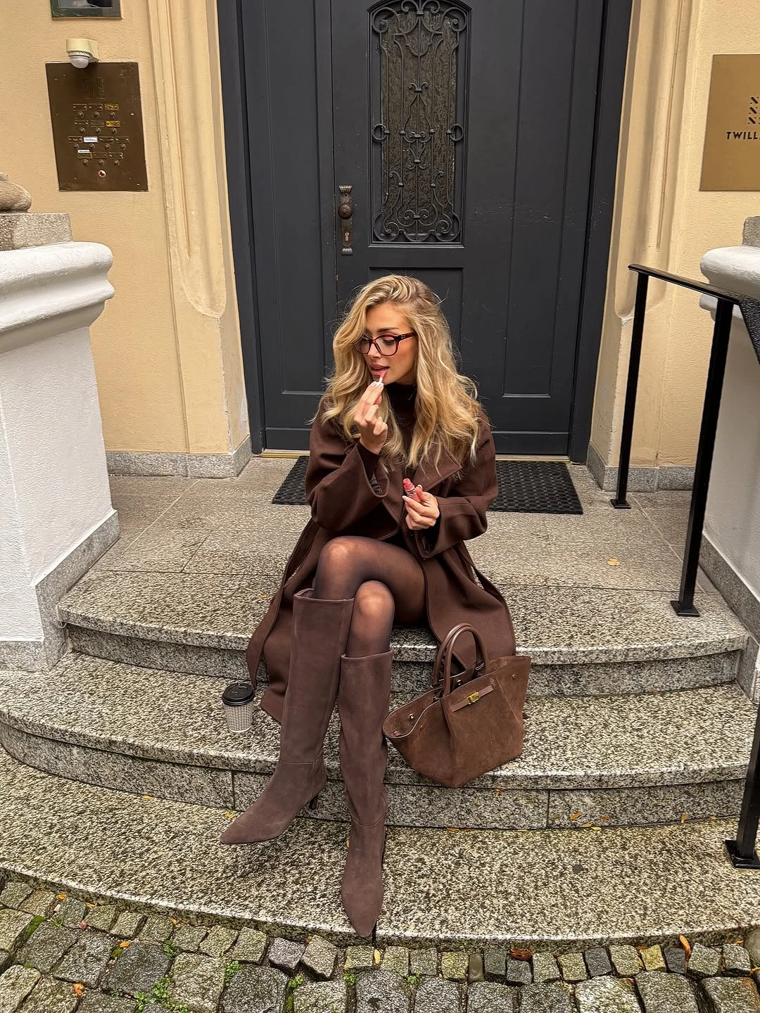 September outfit ideas 2026 chocolate brown coat and tall boots for elegant September days