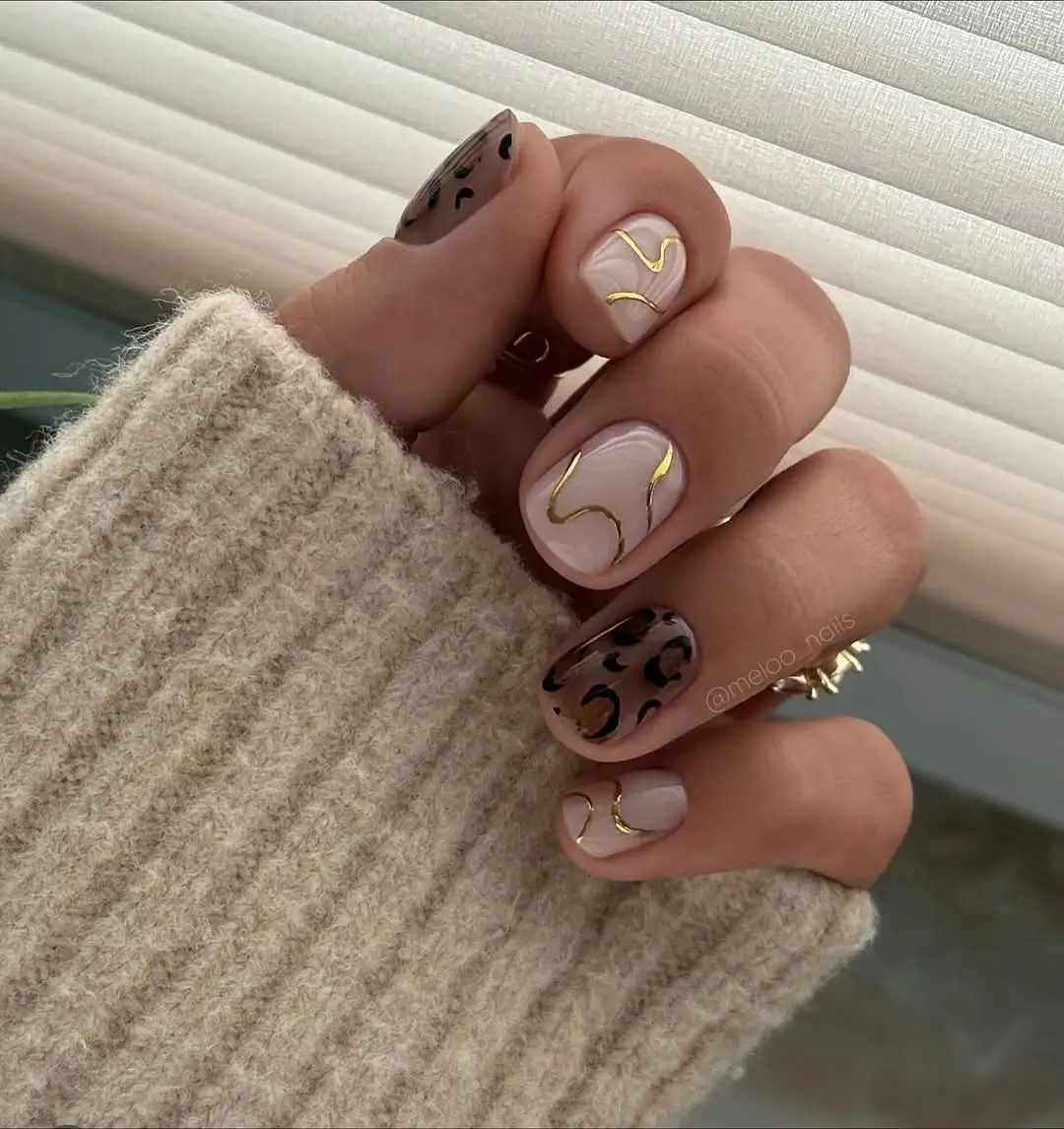 simple fall short nails Soft Nude Nails With Gold Waves And Animal Print Accents