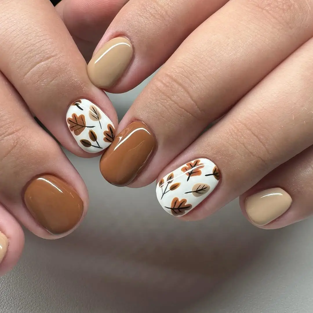 simple fall short nails Caramel Brown Nails With Tiny Autumn Leaves