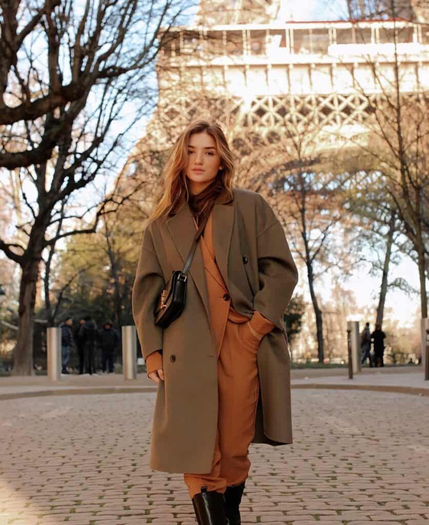 Olive Green Coat Over Rust Orange Turtleneck and Jumpsuit for a Bold Winter Statement Olive Green Coat Over Rust Orange Turtleneck and Jumpsuit for a Bold Winter Statement — Winter Photoshoot Outfits