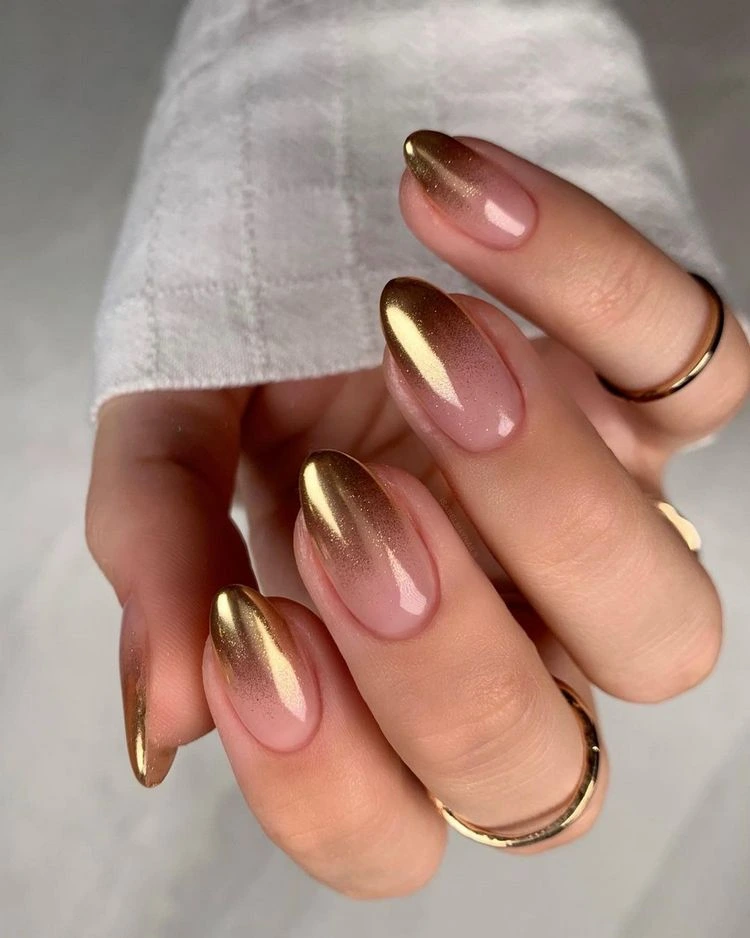 Glossy With Dense Glitter Nude to Gold Glitter Ombre Almonds — Winter Ombre Nails