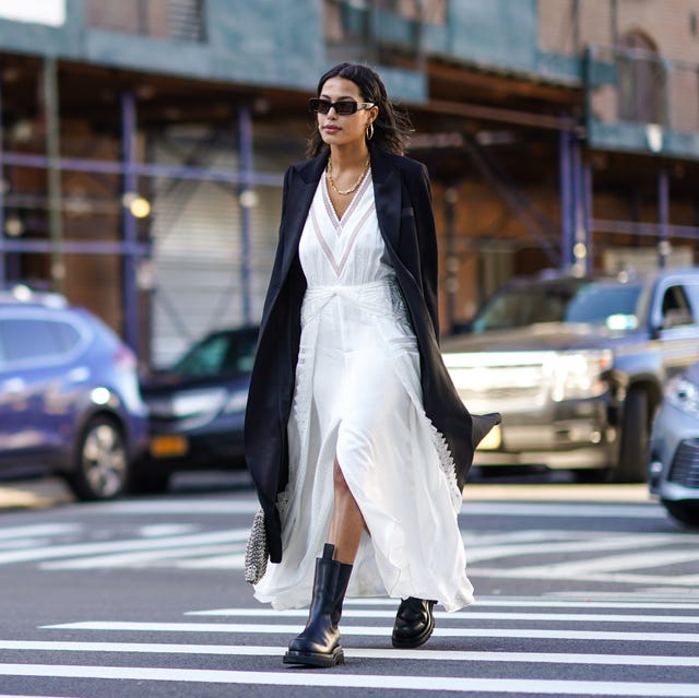 Long Black Coat Over a White Lace Dress and Chunky Boots Long Black Coat Over a White Lace Dress and Chunky Boots — Winter to Spring Transition Outfits