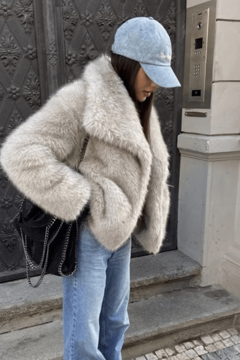 Cozy Beige Fur Jacket Paired with Denim and Sneakers Cozy Beige Fur Jacket Paired with Denim and Sneakers — Winter Outfits for Warm Weather