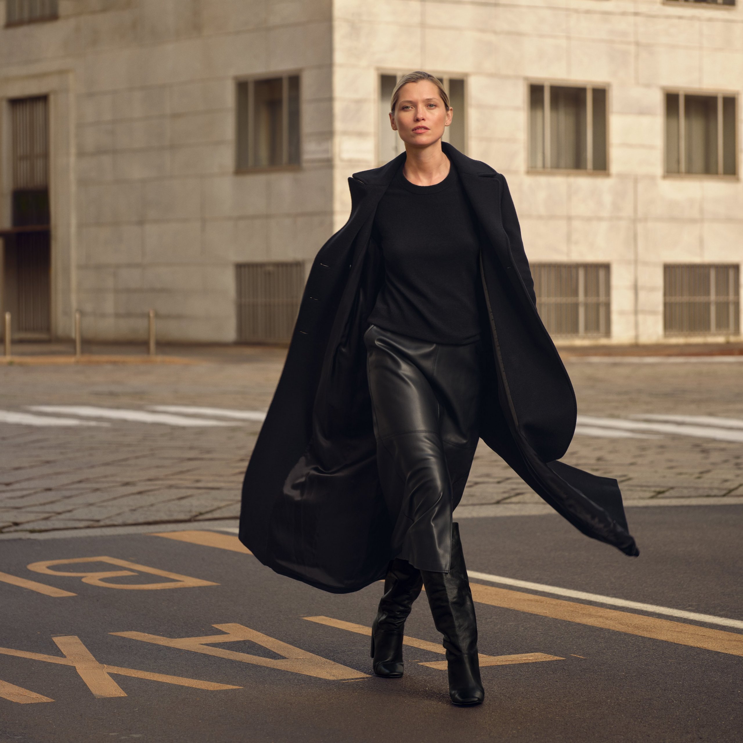 Sleek Black Leather Midi Skirt with a Flowing Coat — Winter Skirt Outfits