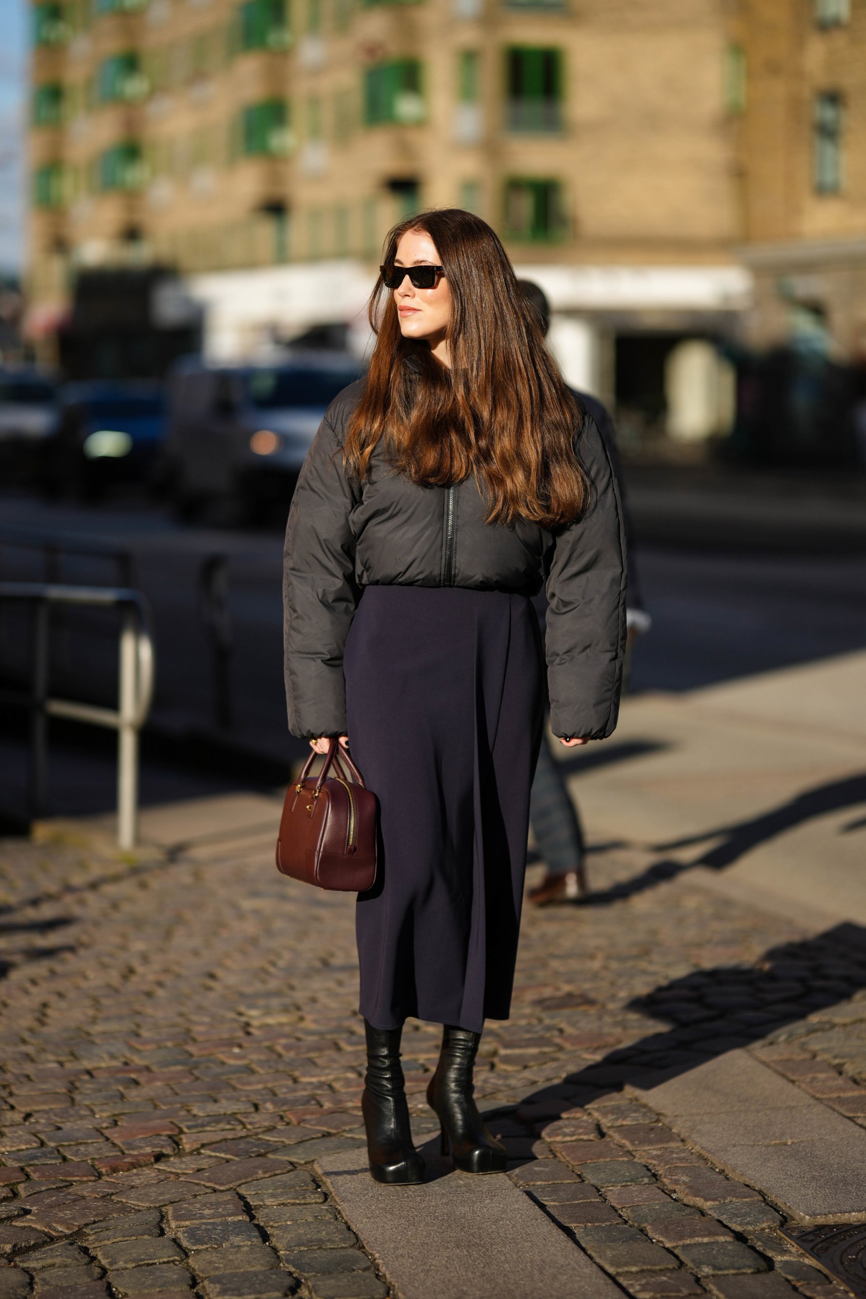 Long Brown Fur Coat Over Grey Pinstripe Trousers Long Brown Fur Coat Over Grey Pinstripe Trousers — Winter to Spring Transition Outfits