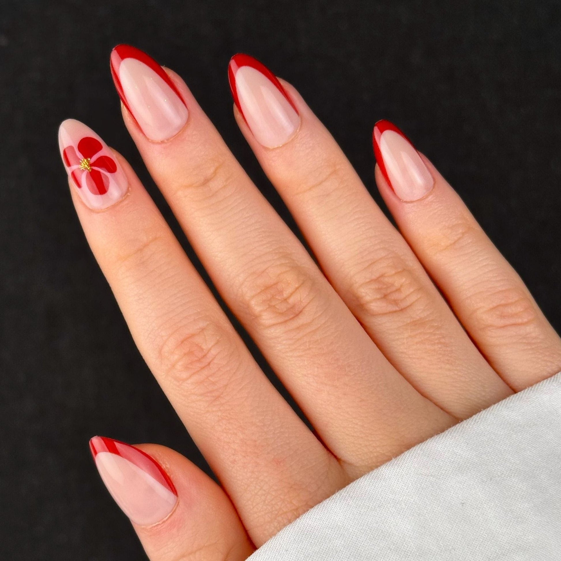 Red French with Floral Accent Almond Nails — Winter Almond Nails