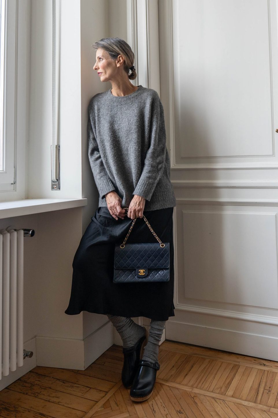 Grey Knit Sweater Over Black Satin Skirt — Minimalist Winter Outfits