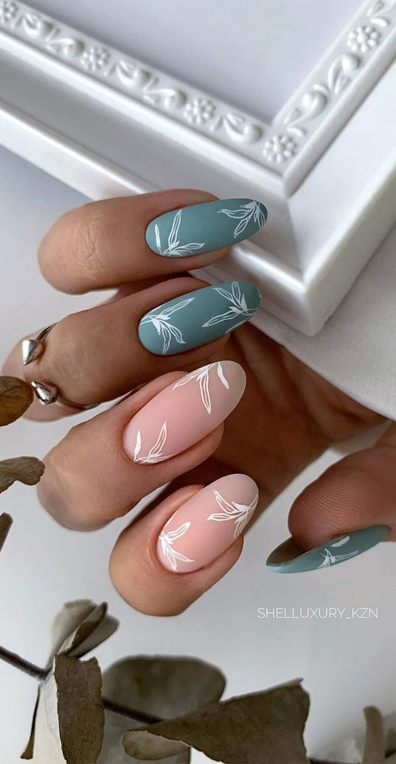 Teal and Pink Matte with Leaf Outlines Teal and Pink Matte with Leaf Outlines — Pastel Winter Nails