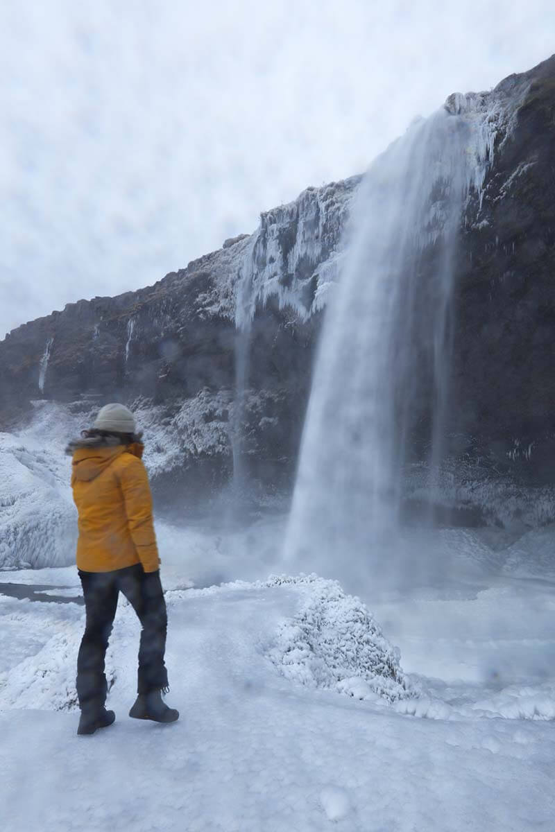 Yellow Puffer Jacket and Grey Beanie for Winter Sightseeing Yellow Puffer Jacket and Grey Beanie for Winter Sightseeing — Iceland Winter Outfits
