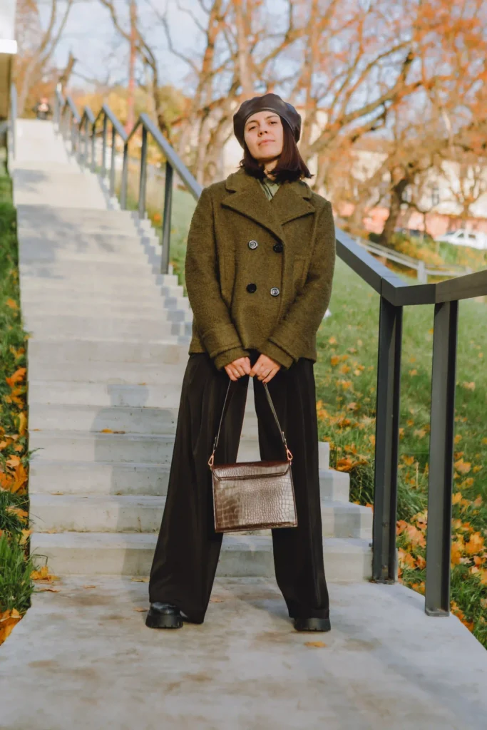 Olive Green Coat with Leather Beret and Wide-Leg Trousers — Winter Layering Outfits