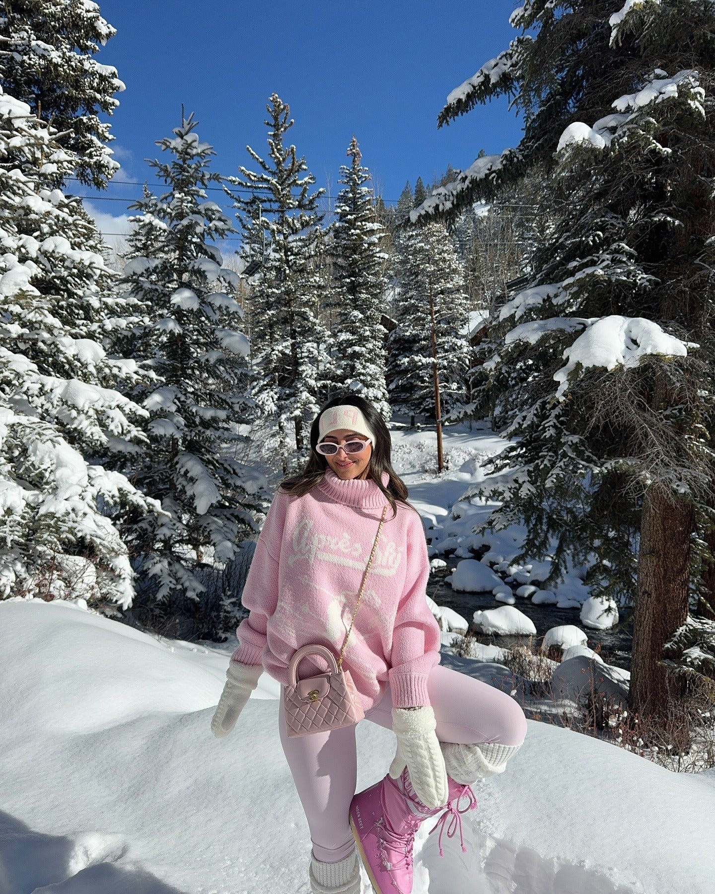 Monochromatic Pink Knit Sweater and Snow Boots for a Playful Winter Photoshoot Monochromatic Pink Knit Sweater and Snow Boots for a Playful Winter Photoshoot — Winter Photoshoot Outfits