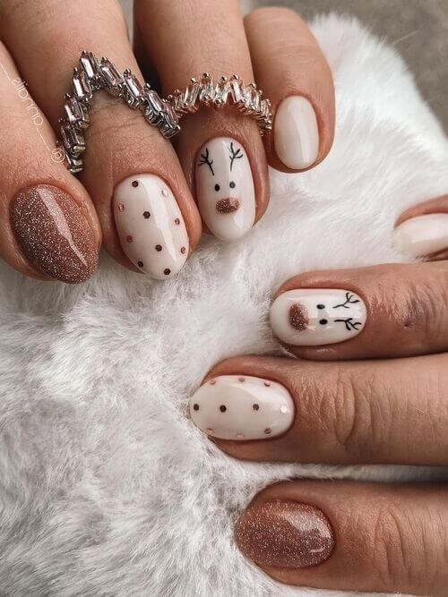 Off-White Nails With Reindeer Faces — Cute Winter Nails