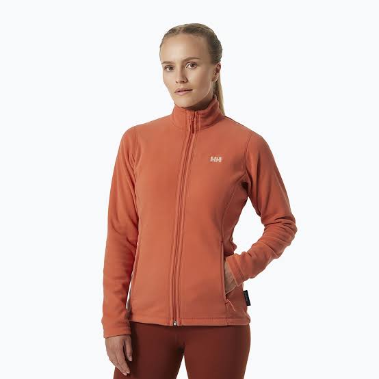 Orange Fleece Jacket Over Dark Brown Pants Orange Fleece Jacket Over Dark Brown Pants — Winter Hiking Outfits