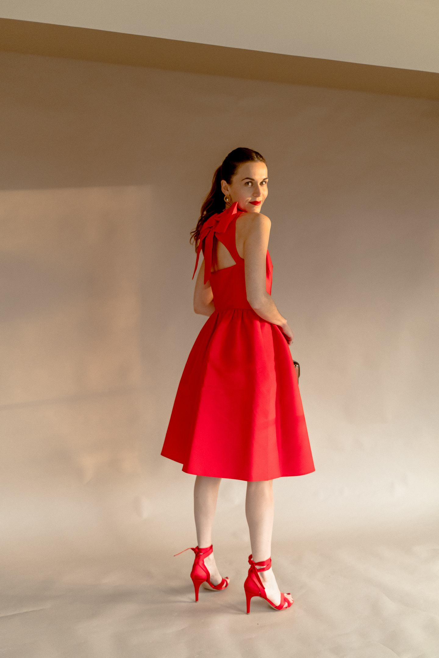Holiday Party Statement: Red A-Line Dress with Bow Detail — December Outfits