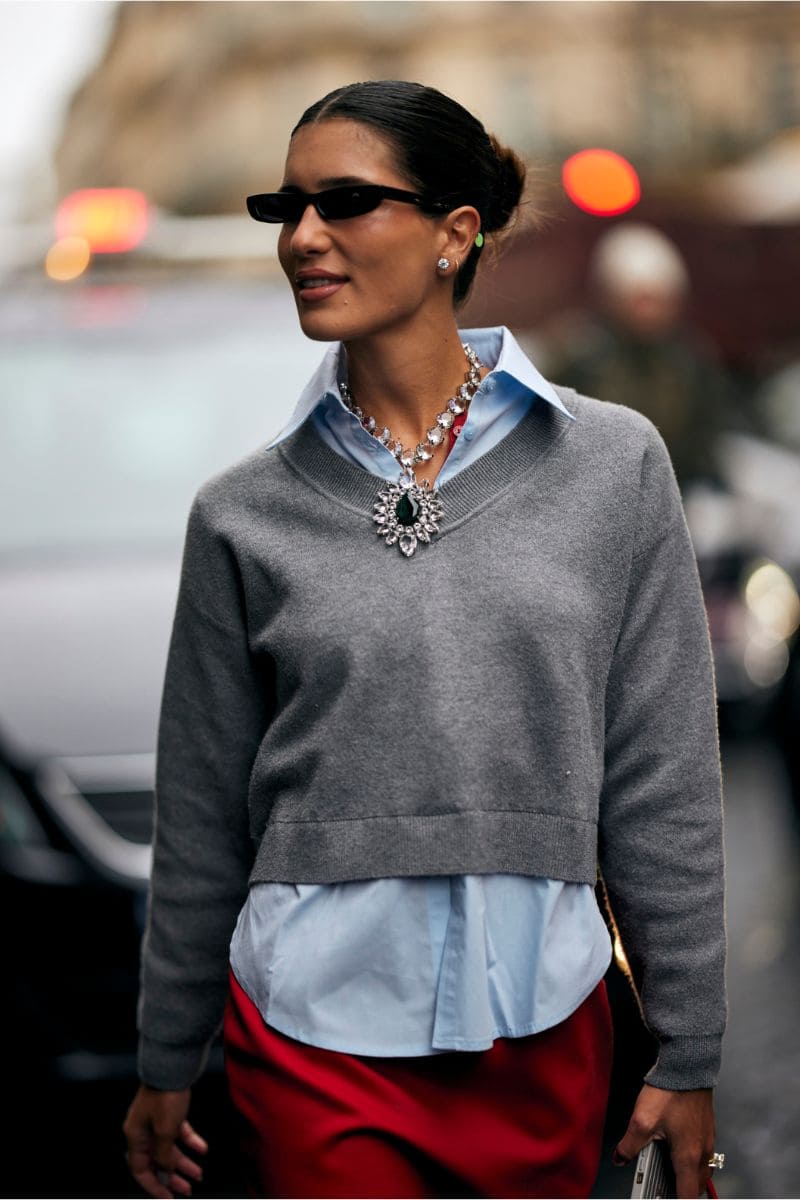 Grey Cropped V-Neck Sweater Over Light Blue Shirt with Red Skirt Grey Cropped V-Neck Sweater Over Light Blue Shirt with Red Skirt — Sweater Outfits