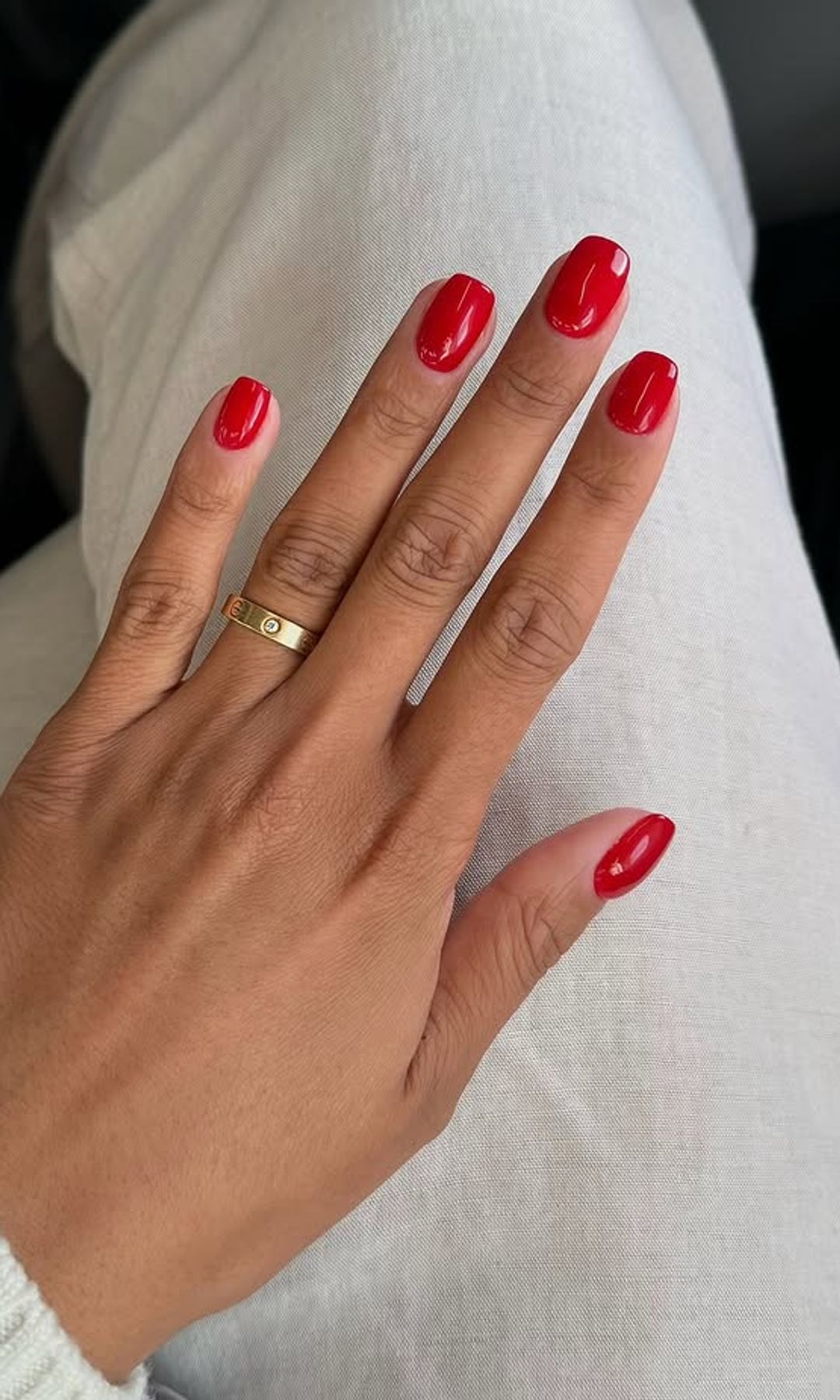 Vibrant Red Glossy Medium Oval Vibrant Red Glossy Medium Oval — Winter Nail Colors for Women Over 60