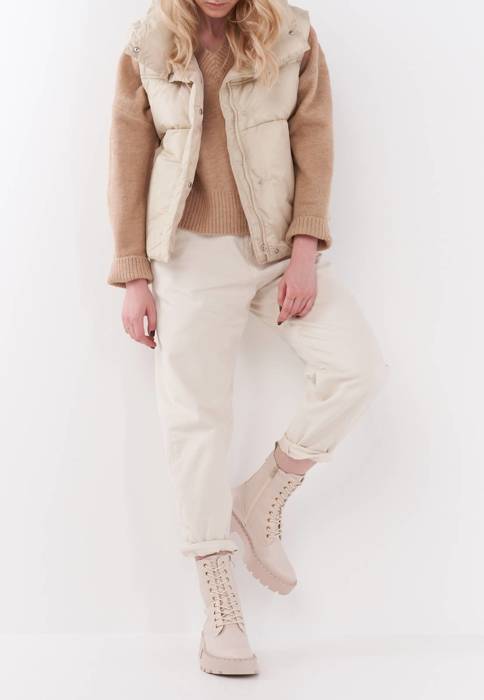 Cream Puffer Vest Over Tan V-Neck Sweater Cream Puffer Vest Over Tan V-Neck Sweater — Winter Hiking Outfits