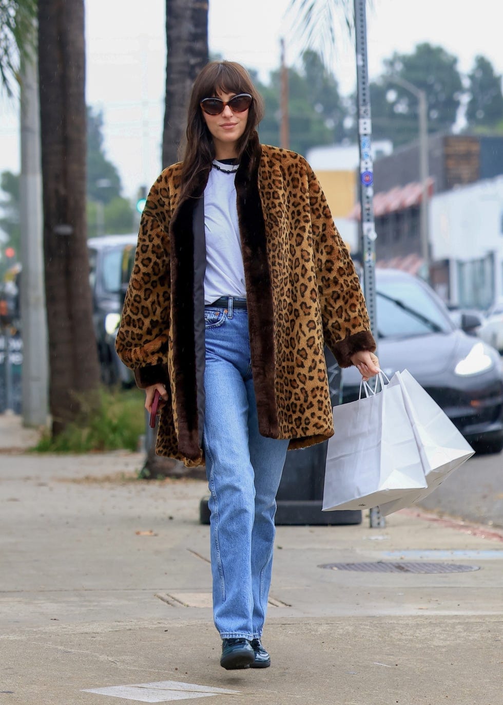 Dakota Johnson's Casual Leopard Coat and Jeans Dakota Johnson's Casual Leopard Coat and Jeans — Leopard Coat Outfits