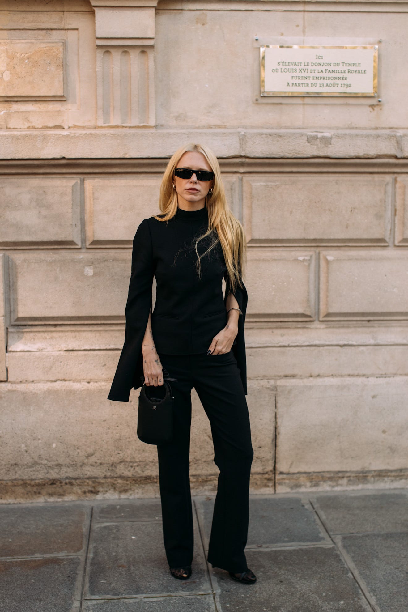 Sleek Black Ensemble with Dramatic Split Sleeves Sleek Black Ensemble with Dramatic Split Sleeves — Classy Winter Outfits