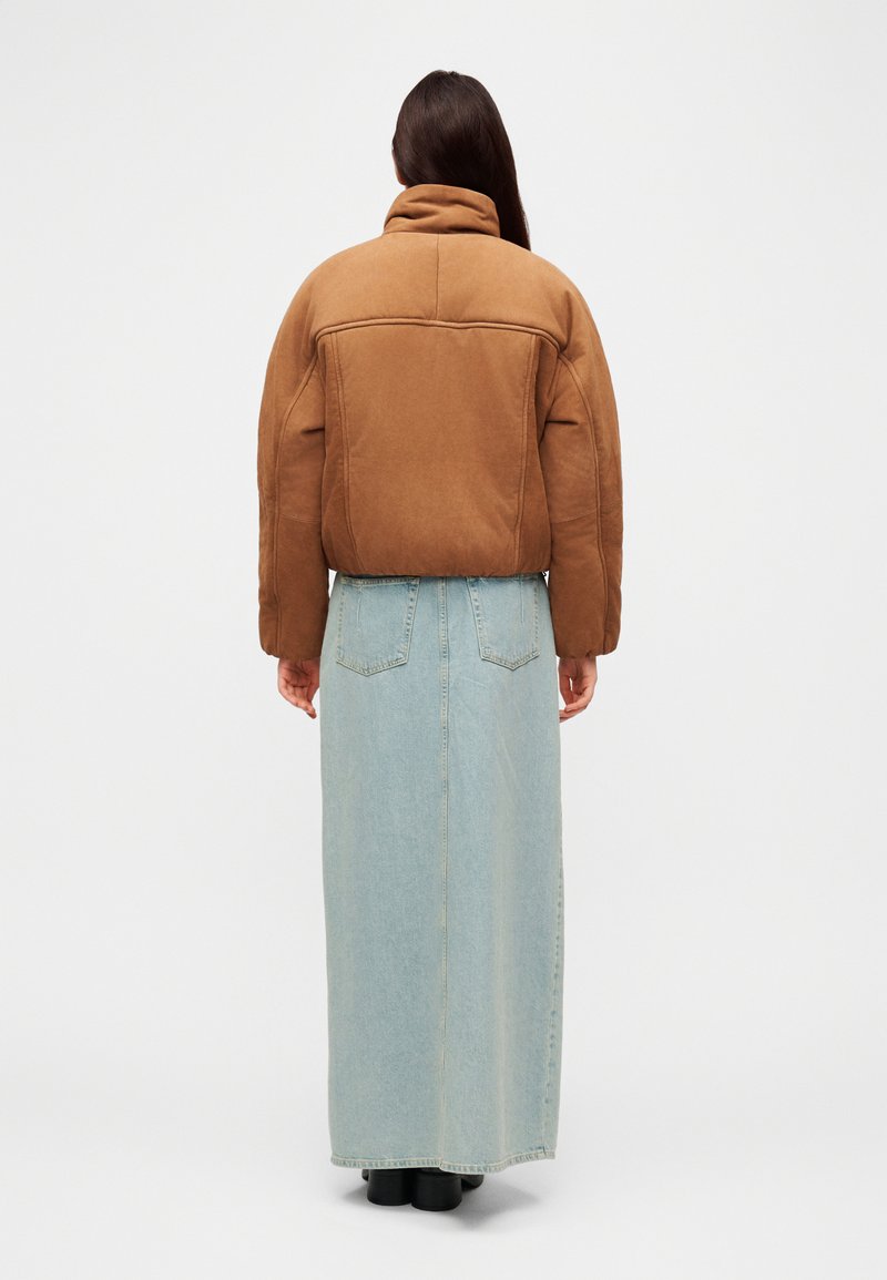 Cropped Puffer Jacket with a Denim Maxi Skirt — Winter Puffer Jacket Outfits