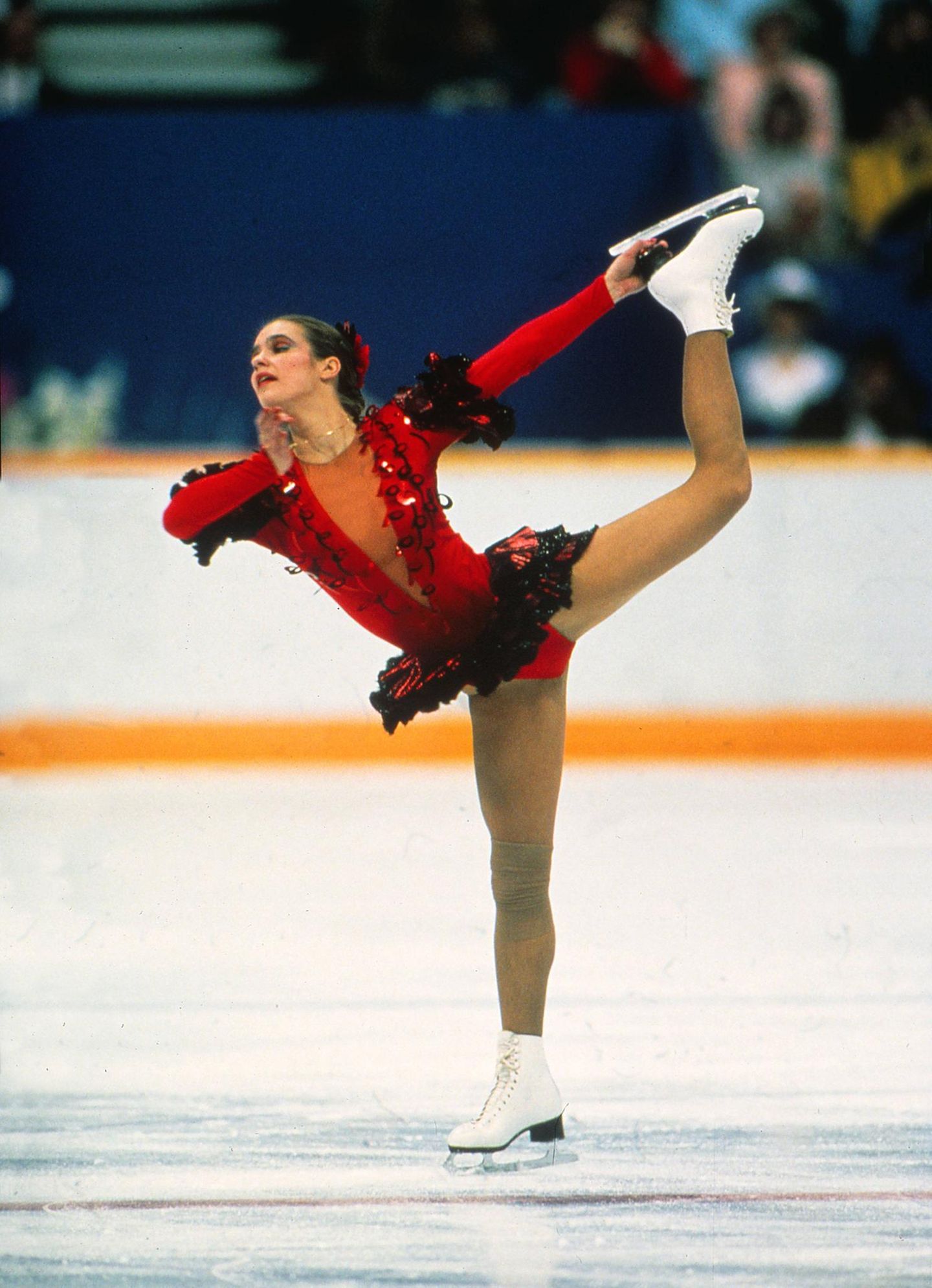 Vibrant Red Ice Skating Costume with Ruffled Trim and Sequins Vibrant Red Ice Skating Costume with Ruffled Trim and Sequins — Ice Skating Outfits