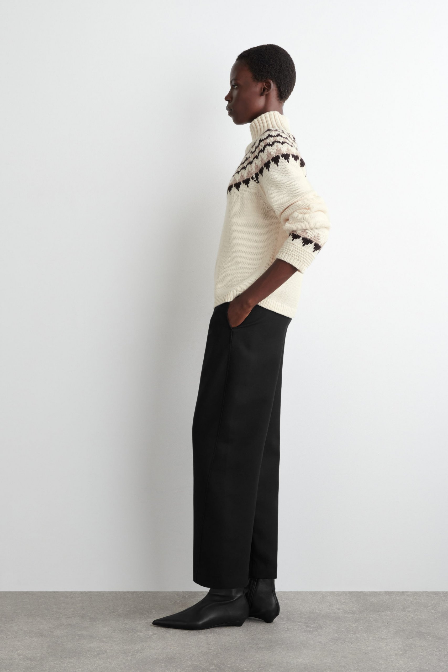 Cream Fair Isle Turtleneck Sweater with Black Wide-Leg Trousers Cream Fair Isle Turtleneck Sweater with Black Wide-Leg Trousers — Fair Isle Sweater Outfits