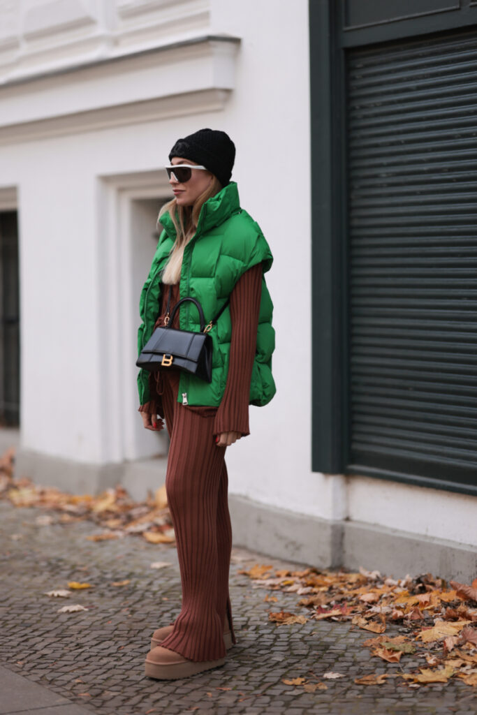 Black Puffer Jacket Styled Over Collared Shirt and Jeans — Puffer Vest Outfits