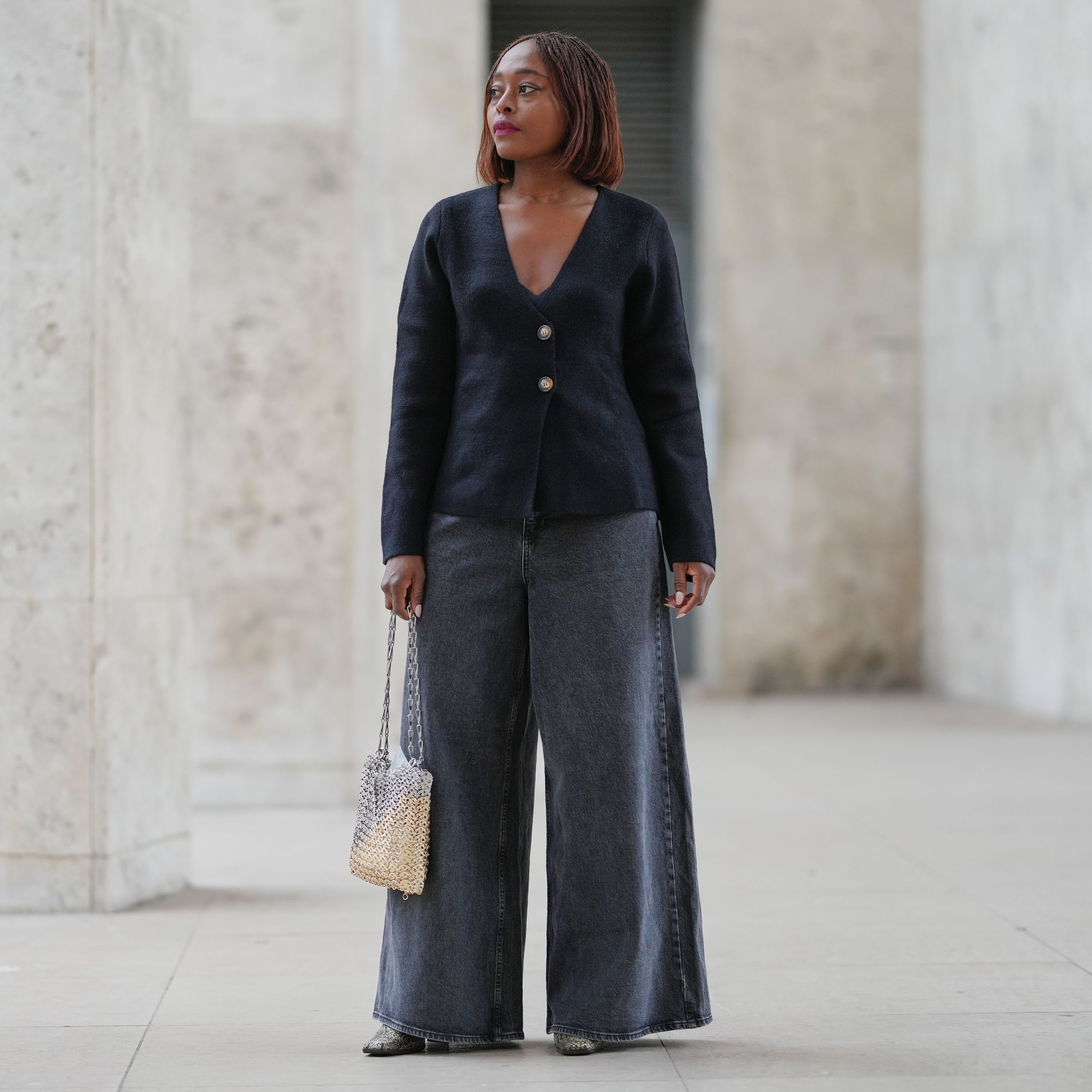 Silver Metallic Ankle Boots Elevate a Black Knit Top and Wide-Leg Jeans Silver Metallic Ankle Boots Elevate a Black Knit Top and Wide-Leg Jeans — Ankle Boots Outfits