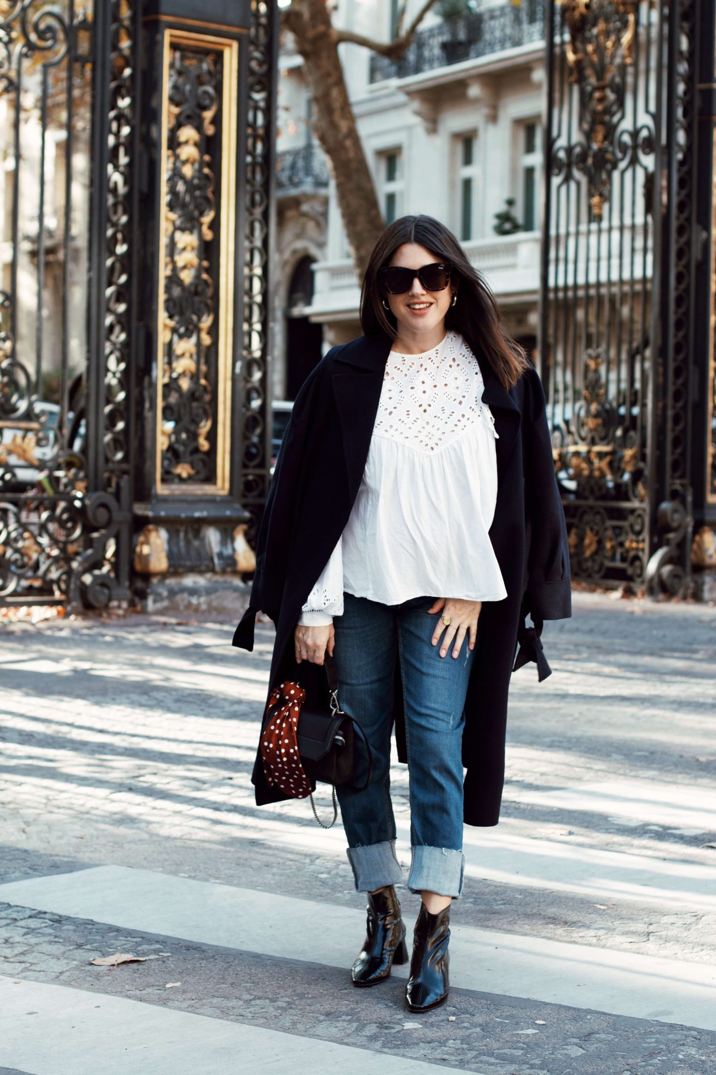 Black Wool Coat Layered Over White Eyelet Top and Cuffed Jeans Black Wool Coat Layered Over White Eyelet Top and Cuffed Jeans — Winter Maternity Outfits