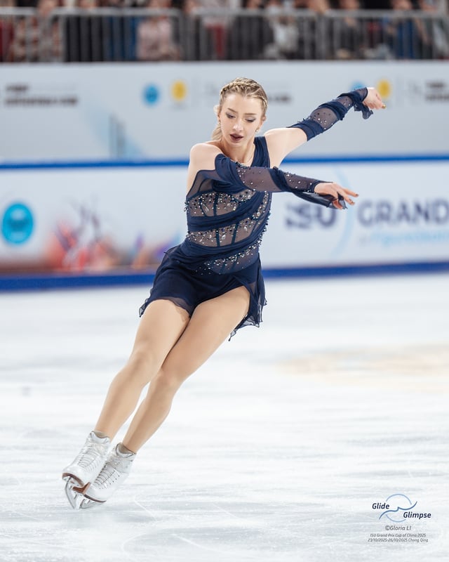 Navy Blue Ice Skating Dress with Ornate Rhinestone Bodice and Sheer Skirt Navy Blue Ice Skating Dress with Ornate Rhinestone Bodice and Sheer Skirt — Ice Skating Outfits