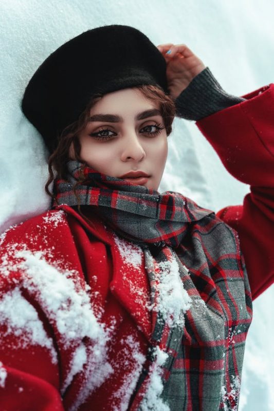 Vibrant Red Wool Coat with Plaid Scarf for a Festive Winter Photo Vibrant Red Wool Coat with Plaid Scarf for a Festive Winter Photo — Winter Photoshoot Outfits