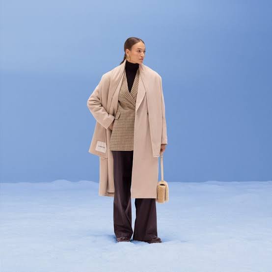 Layered Beige Peacoat Over a Checked Blazer Layered Beige Peacoat Over a Checked Blazer — Peacoat Outfits