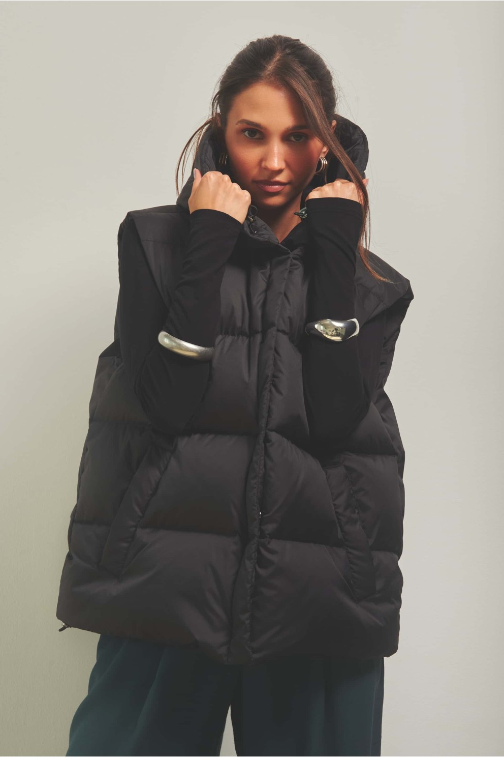 Oversized Black Puffer Vest with Teal Wide-Leg Pants — Puffer Vest Outfits