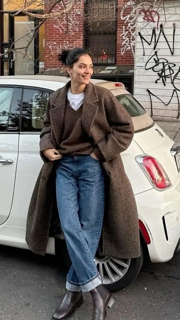 Cozy Herringbone Coat Over White Tee and V-Neck Sweater with Dark Brown Ankle Boots Cozy Herringbone Coat Over White Tee and V-Neck Sweater with Dark Brown Ankle Boots — Ankle Boots Outfits