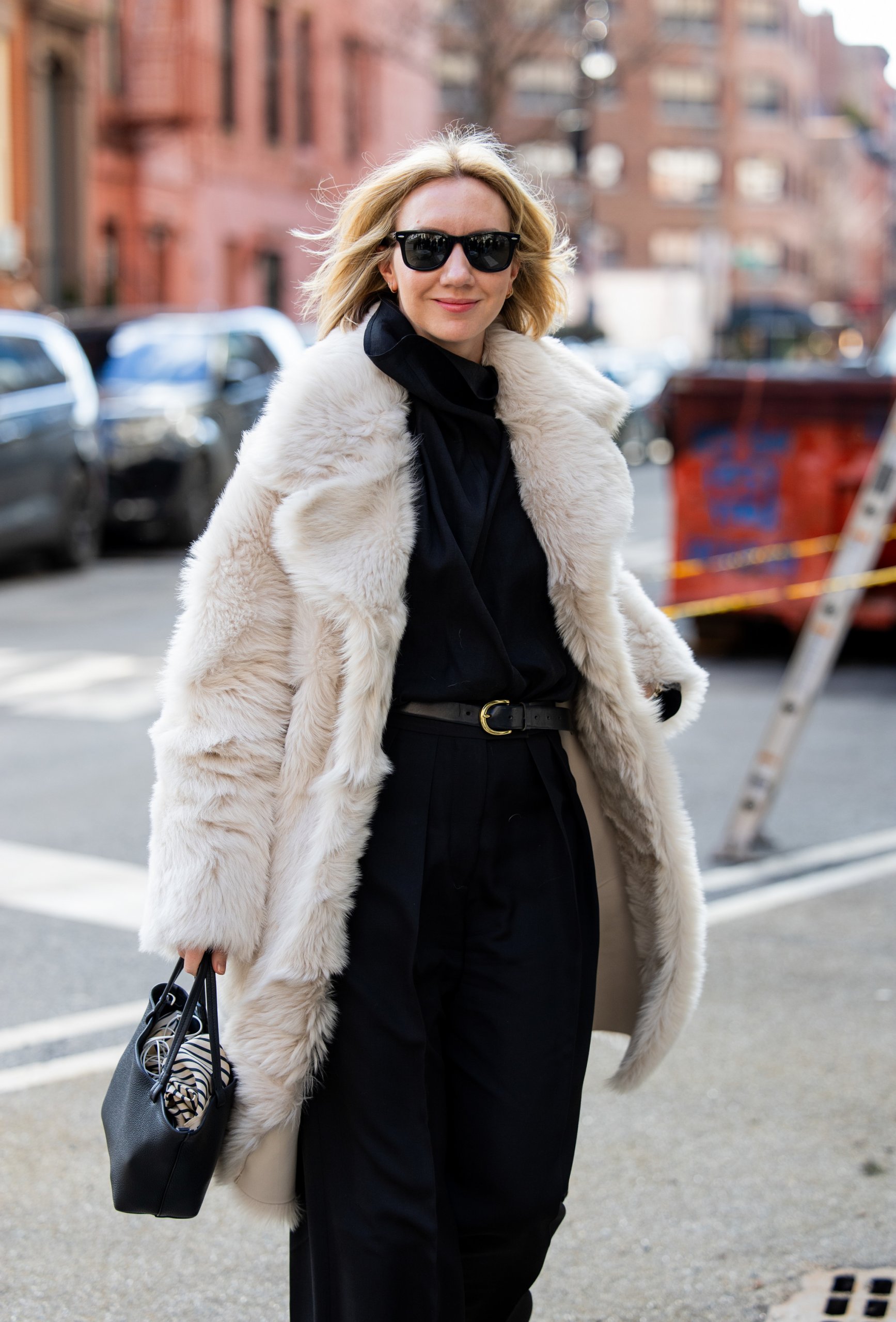 Cream Faux Fur Coat: Chic Layering Over All Black — NYC Winter Outfits