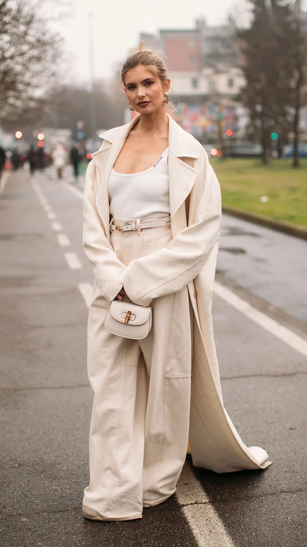Cream Oversized Trench Coat with White Tank and Trousers Cream Oversized Trench Coat with White Tank and Trousers — Italy Winter Outfits
