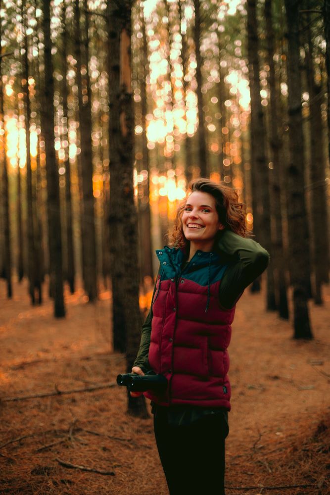 Burgundy Puffer Vest with Teal Shirt and Olive Green Sleeves — Puffer Vest Outfits