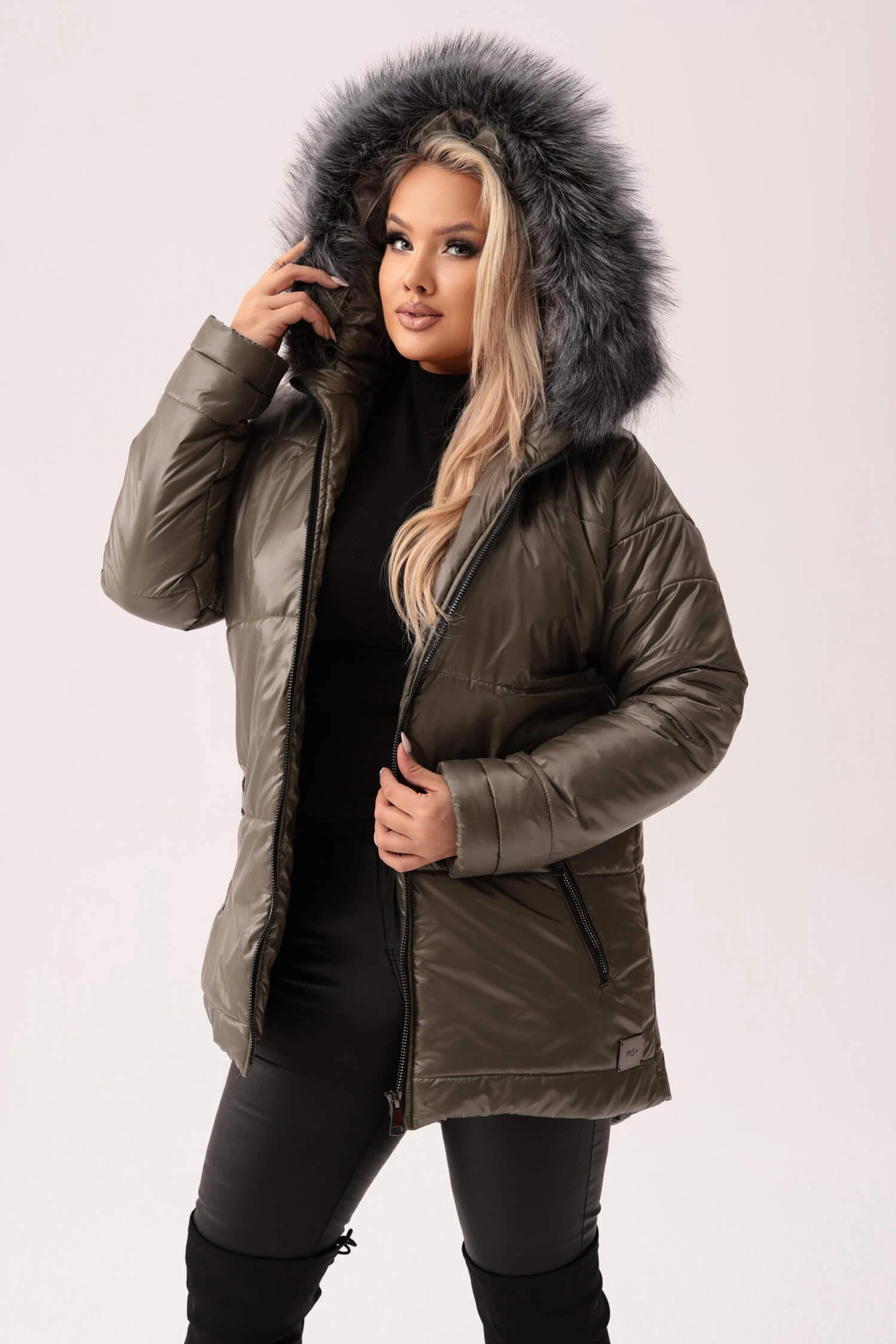 Khaki Puffer Jacket with Fur Trim and Black Base Layers — Winter Outfits for Plus Size Women