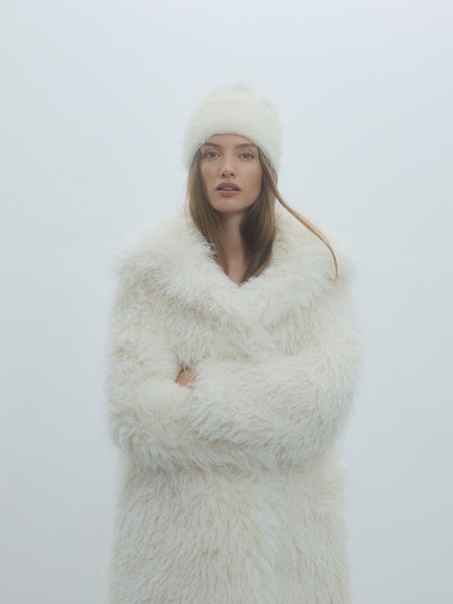 Elegant Winter Statement with a White Fur Ensemble — Fur Hat Outfits