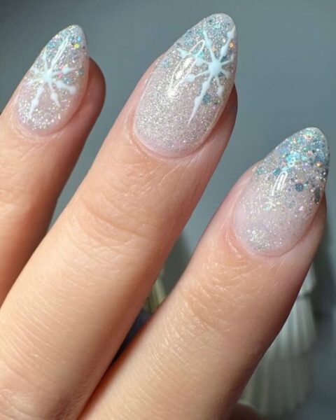 Snowflake Motif With Glitter Accents Visual Idea — Winter Wonderland Nails