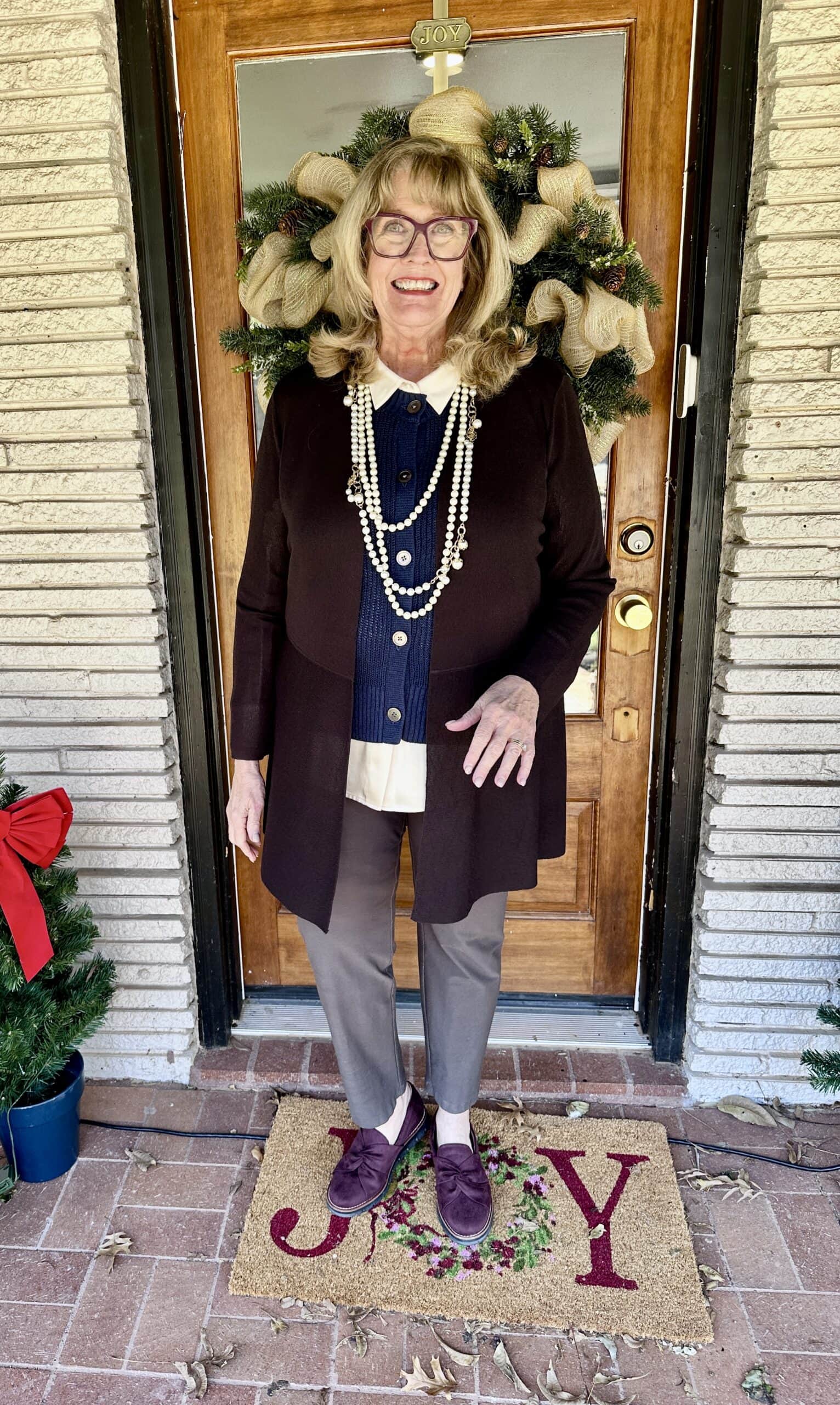 Layered Knitwear with Beige Pants and Purple Shoes Layered Knitwear with Beige Pants and Purple Shoes — Winter Outfits for Women Over 60
