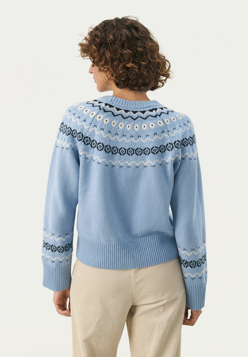 Light Blue Fair Isle Sweater with Beige Corduroy Trousers for Everyday Style Light Blue Fair Isle Sweater with Beige Corduroy Trousers for Everyday Style — Fair Isle Sweater Outfits