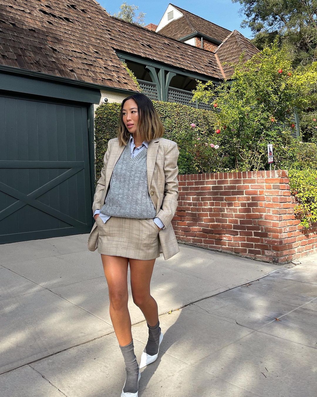 Light Blue Shirt and Cable-Knit Vest with Plaid Mini Skirt and Socks — Close-Up Take — Winter Business Casual Outfits