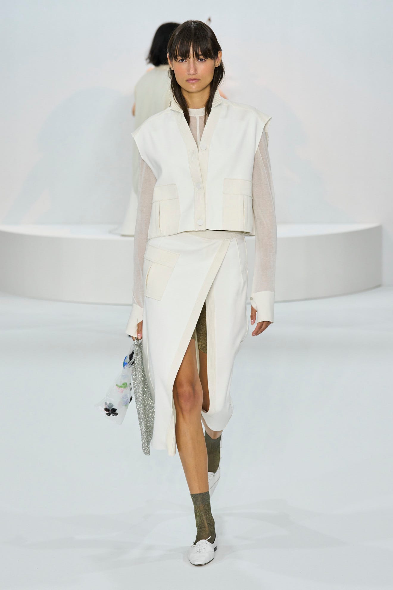 All-White Ensemble with Sheer Top and Cropped Vest — Minimalist Winter Outfits