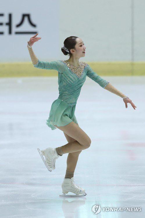 Mint Green Sequined Ice Skating Dress with Embellished V-Neckline Mint Green Sequined Ice Skating Dress with Embellished V-Neckline — Ice Skating Outfits