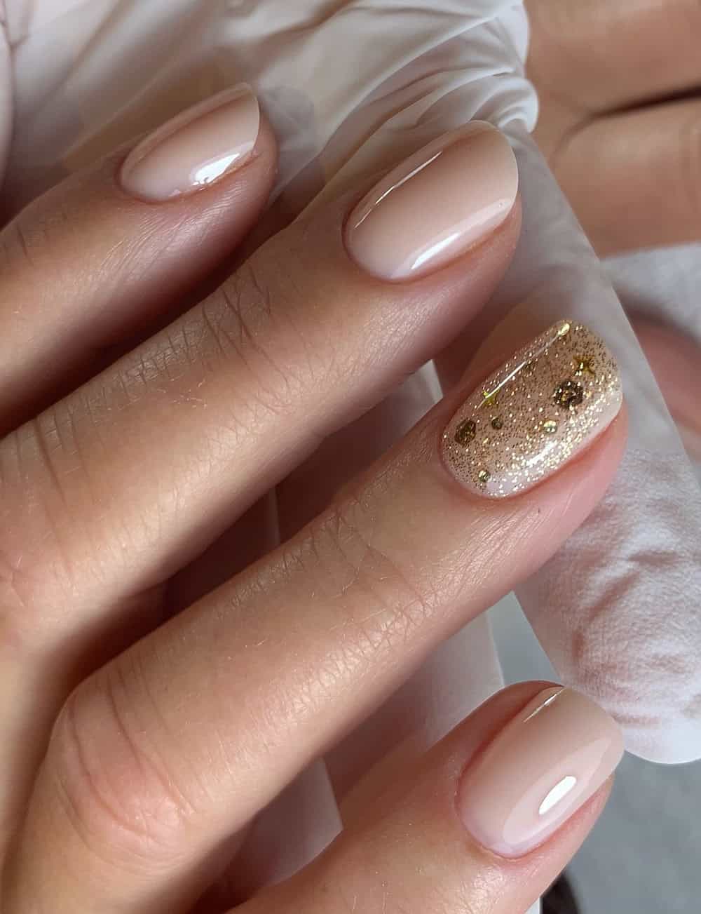 Gold Glitter Accent On The Ring Finger Visual Idea — Winter Nude Nails