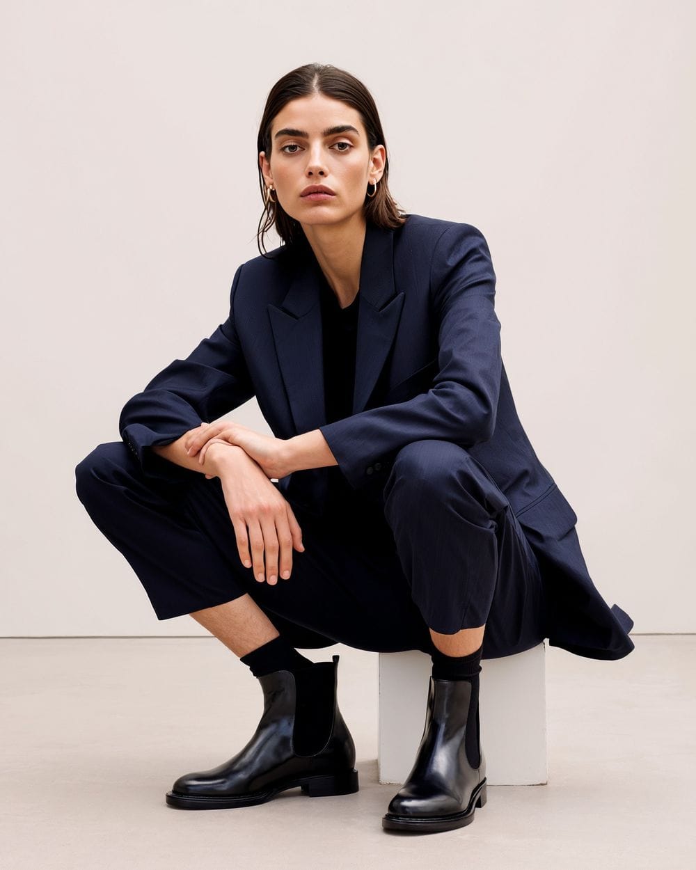 Business Casual Polish: Black Chelsea Boots with a Navy Suit Business Casual Polish: Black Chelsea Boots with a Navy Suit — Chelsea Boots Outfits