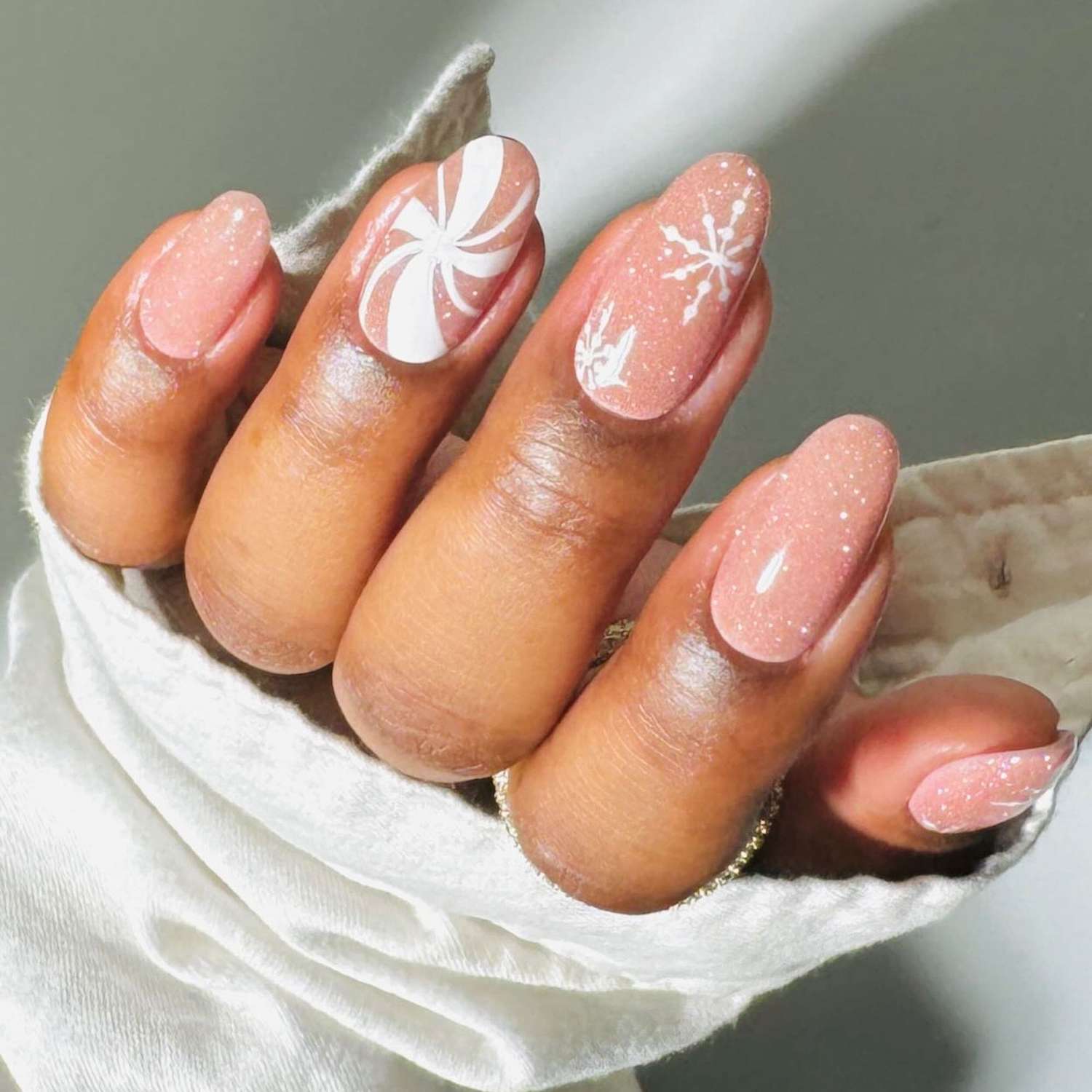 Light Pink with Snowflake Art — Medium Length Winter Nails