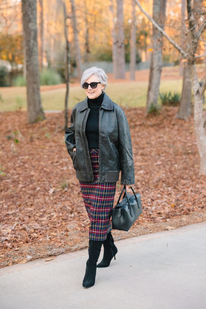 Bold Plaid Skirt Paired with Leather Jacket and Turtleneck Bold Plaid Skirt Paired with Leather Jacket and Turtleneck — Winter Outfits for Women Over 60