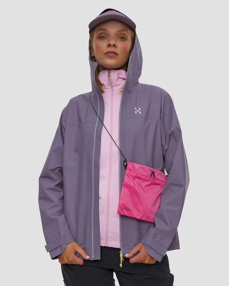 Grey Hooded Waterproof Jacket Over Striped Top Grey Hooded Waterproof Jacket Over Striped Top — Winter Hiking Outfits